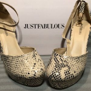 Snakeskin platform pumps